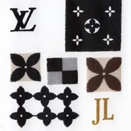 Louis Vuitton-Inspired Tactile Design Guide (1200 characters)

Logo: The interlocking "LV" monogram mimics two ribbons—one curved ("J"), one angular ("L")—meeting in symmetrical balance. Embossed or engraved, the letters feel crisp and unbroken, like polished metal or carved wood. Edges are smooth, solid, and elegantly precise.

Monogram Pattern: A grid of repeating shapes:

Quatrefoils: Four-petaled floral forms, rounded and slightly raised, like a clover pressed into wax.

Diamonds: Sharp-cornered shapes nestled between flowers, their pointed edges contrasting the soft petals.

Hidden "JL": Miniature logos tucked into negative spaces, detectable as subtle ridges.
Texture: Uniform rhythm, like tiles underfoot; durable, finely woven fabric with a subtle grain.

Damier Checkerboard: Chessboard-like squares alternating textures:

Smooth: Cool, polished leather (glossy finish).

Textured: Matte canvas (pebbled feel).
Edges are razor-sharp, creating stability through repetition.

Colors (Textural Analogies):

Gold: Cool, metallic smoothness (like a coin’s surface), radiating warmth.

Rich Browns: Earthy, aged leather—dry, powdery, timeless.

Contrasts: Light/dark interplay evokes rhythmic balance (alternating piano keys).

Essence: Precision, heritage, and tactile harmony—luxury felt through symmetry, contrast, and hidden details.

Do this for the initials J L instead of L and V